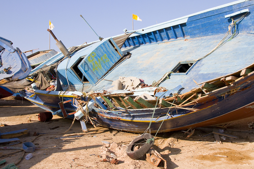 lampedusa-pescatori-profughi-shutterstock_152651534