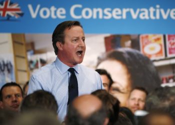 Britain's Prime Minister and leader of the Conservative Party, David Cameron, gives a speech during his general election campaign visit at the Institute of Chartered Accountants in London on Monday April 27, 2015.  Britain goes to the polls on May 7 to elect a new parliament. (Adrian Dennis/Pool Photo via AP)