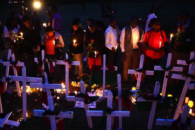 Kenya red cross team gather for a candlelight vigil to mourn the 148 people killed in Garissa attack