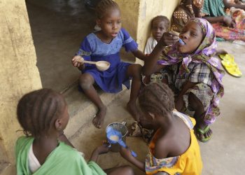 Children rescued by Nigerian soldiers from Boko Haram extremists at Sambisa Forest rest at a refugee camp in Yola, Nigeria Monday, May 4, 2015. Even with the crackle of gunfire signaling rescuers were near, the horrors did not end: Boko Haram fighters stoned captives to death, some girls and women were crushed by an armored car and three died when a land mine exploded as they walked to freedom.  (AP Photo/Sunday Alamba)