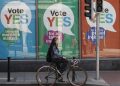 YES posters cover a shop's windows in the center of Dublin, Ireland, Thursday May 21, 2015.  People from across the Republic of Ireland will vote Friday in a referendum on the legalization of gay marriage, a vote that pits the power of the Catholic Church against the secular-minded Irish government of Enda Kenny.  (AP Photo/Peter Morrison)