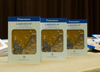 The handout picture provided by L'Osservatore Romano on 18 June 2015 shows some copies of Pope Francis's encyclical, a collection of principles to guide Catholic teaching, entitled "Laudato Si", lying on a table during its official presentation at the Sinod hall in the Vatican, 18 June 2015. ANSA/ L'OSSERVATORE ROMANO   +++ ANSA PROVIDES ACCESS TO THIS HANDOUT PHOTO TO BE USED SOLELY TO ILLUSTRATE NEWS REPORTING OR COMMENTARY ON THE FACTS OR EVENTS DEPICTED IN THIS IMAGE; NO ARCHIVING; NO LICENSING +++