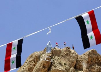 epa04797277 A general view shows a statue of Mary before being inaugurated atop a mountain overlooking the ancient town of Maaloula, Syria, 13 June 2015. According to media reports, an official ceremony was held at St. Thecla convent in Maaloula, Syria, to where a number of stolen icons and pieces have been handed over on 13 June 2015. The stolen pieces were restored from Lebanon and include three pieces of a Bronze statue of Jesus Christ, three bells, icons and religious books. Extremists overran the iconic ancient town, located near Damascus, in 2013, and vandalized and destroyed parts of it. Several pieces and icons have been restored to Maaloula gradually after the army recaptured the town in April 2014.  EPA/YOUSSEF BADAWI