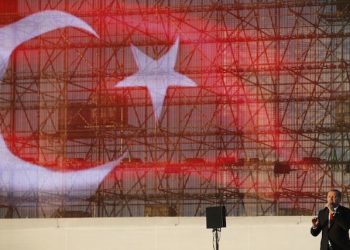 In this Saturday, May 30, 2015, photo, Turkey's President Recep Tayyip Erdogan delivers a speech in Istanbul, Turkey, during a rally to commemorate the anniversary of city's conquest by the Ottoman Turks. Turkey will hold general election on June 7.  (AP Photo/Lefteris Pitarakis)