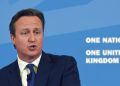 Britain's Prime Minister David Cameron delivers a speech, where he said that new Government legislation will include powers to put non-violent extremists who radicalize young people "out of action", at Ninestiles Academy in Birmingham, England, Monday, July 20, 2015. Cameron is launching a five-year plan to defeat Islamic extremism, saying it's time to counter the ideology that has attracted so many young people to the Islamic State group. In what is being billed as his most important speech on the subject, Cameron says the extremist ideology of the group, also known as ISIL, must be countered so Britain becomes a more cohesive nation in which young Muslims feel they have a stake. (Paul Ellis/PA via AP)     UNITED KINGDOM OUT      -    NO SALES     -    NO ARCHIVES