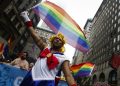 epa04823174 People are seen here on 5th Avenue during the annual 2015 New York City Pride March in Manhattan, New York, New York, USA, 28 June 2015. Gay and lesbian couples in the United States have a constitutional right to marry in all 50 states, the Supreme Court ruled on 26 June. The 5-4 decision was greeted by gay rights activists and US President Barack Obama, who declared it 'a victory for America.'  EPA/JOHN TAGGART