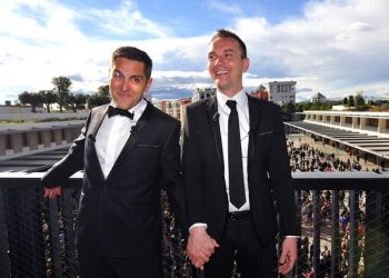 epa03722978 Vincent Autin (R) and his partner Bruno Boileau (L) pose for photographers during their marriage in Montpellier, southern France, 29 May 2013. France's first gay marriage was sealed 29 May in the southern city of Montpellier, where Vincent Autin and Bruno Boileau became the first same-sex couple to say 'I do.' Autin, 40, and Boileau, 30, were married by Montpellier's Socialist mayor, three days after the last of massive, increasingly violent protests over a gay marriage and adoption bill that became law 28 May.  EPA/GERARD JULIEN/POOL