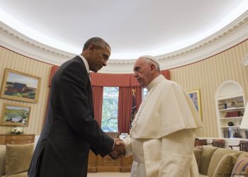 In this photo taken Wednesday, Sept. 23, 2015, President Barack Obama shakes with Pope Francis in the Oval Office of the White House, in Washington. (L'Osservatore Romano/Pool Photo via AP)