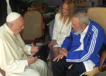 In this photo taken on Sunday, Sept. 20, 2015 Pope Francis talks to Cuba's Fidel Castro, in Havana, Cuba. The Vatican described the 40-minute meeting at Castro's residence as informal and familiar, with an exchange of books. (L'Osservatore Romano/Pool Photo via AP)