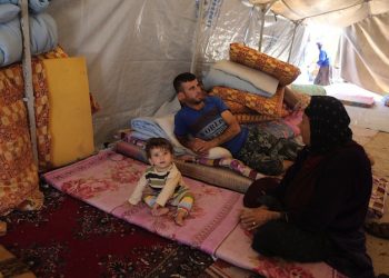 epa04387528 Christians forced to flee Islamic State militants in Mosul, shelter at the St. Joseph Church in Erbil, northern  Iraq, 06 September 2014. Fighters from the Islamic State (IS) made swift miltary gains across Iraq prompting an ongoing international and regional humanitarian and military response, as thousands of people from various religious groups fled areas coming under IS control to the mainly Kurdish north of Iraq.  EPA/MOHAMED MESSARA