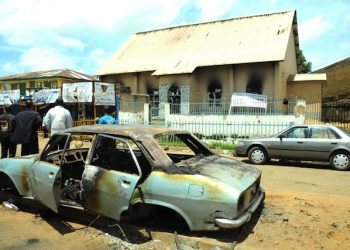 epa04834370 A view of a destroyed car after a bomb blast at the premises of The First African Church Mission Inc. at the city centre in Jos, Nigeria on 06 July 2015. Twin suicide bombings targeting a mosque and a restaurant left 49 people dead in the north-central Nigerian city of Jos, a source involved with the rescue operation said. The suicide bombings followed a string of attacks attributed to the Islamist group Boko Haram, which claimed more than 200 lives in Nigeria in less than a week.  EPA/STRINGER