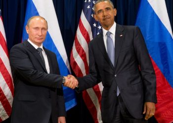 United States President Barack Obama, right, and Russia's President President Vladimir Putin pose for members of the media before a bilateral meeting Monday, Sept. 28, 2015, at United Nations headquarters. (AP Photo/Andrew Harnik)