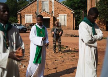 epa04333244 A French soldier of the military Operation Sangaris stands guard at the St. Joseph Cathedral, the site of an attack by Seleka rebel fighters earlier in the month, during Sunday Mass in Bambari, Central African Republic, 27 July 2014. The attack on the church, where thousands of Christians had taken refuge, left an estimated 17 people dead and many others injured. Violence between the anti-Balaka and Seleka rebel groups continues despite the ceasefire agreement signed in Congo Brazzaville on 24 July. Thousands have been killed in the conflict since 2013 with nearly a million being forced from their homes.  Bambari, controlled by the Muslim-majority Seleka, has seen some of the heaviest fighting in the country in the past month and is now considered a fault line dividing the Christian-dominated south from the mostly Muslim-dominated north.  EPA/TANYA BINDRA