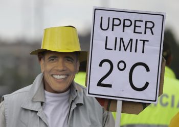 A man wearing a U.S. President Barack Obama mask takes part in a silent march calling for ambitious action to tackle climate change, in Bogota, Colombia, Sunday, Nov. 29, 2015. The group urges decisive actions from world leaders who will gather in Paris for the 21st Conference of Parties (COP 21) of the United Nations Framework Convention on Climate Change. (AP Photo/Fernando Vergara)