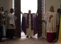 In this picture taken Sunday, Nov. 29, 2015, Pope Francis opens the holy door of the Bangui cathedral, Central African Republic. Pope Francis is in Africa for a six-day visit that is taking him to Kenya, Uganda and the Central African Republic.  (L'Osservatore Romano/Pool Photo via AP)