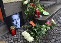 epa05096986 Flowers and candles have been placed around a photo of David Bowie in front of the singer's former residence at Hauptstrasse 155 in†Berlin, Germany, 11 Janaury 2016.  A card which was placed between the flowers reads 'For David, Thank you for the music!'. Bowie. According to reports quoting David Bowie's son and his official Facebook page, Bowie, 69, has died on 10 January 2016 after a battle with cancer. 'David Bowie died peacefully surrounded by his family after a courageous 18 month battle with cancer. While many of you will share in this loss, we ask that you respect the family's privacy during their time of grief,' read a statement posted on the artist's official social media accounts.  EPA/JENS KALAENE