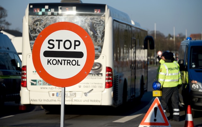 Members of the Danish police have set up a border checkpoint at Krusa border crossing near Flensburg, Germany,  Tuesday Jan. 5, 2016. Denmark introduced temporary controls along its border with Germany.   (Carsten Rehder/dpa via AP)