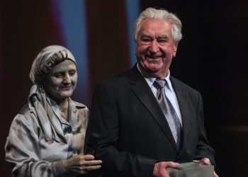 epa04493741 Anton Srholec from Slovakia holds Memory of National Award during ceremony at National Theatre in Prague, Czech Republic, 17 November 2014. According to the organisation, the Memory of National Awards is presented to individuals whose actions promote honour, freedom, and human dignity. The nominees include twenty individuals from the Czech Republic, Slovakia, Germany, Hungary, and Poland, five of whom will receive an award.  EPA/FILIP SINGER