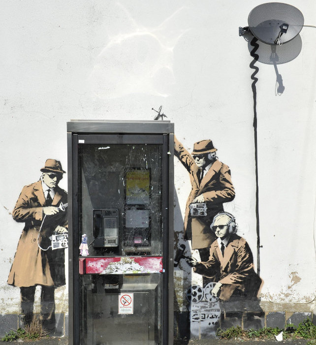 intercettazioni-graffito-banksy-ansa