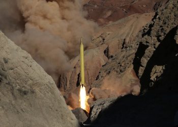 In this photo obtained from the Iranian Fars News Agency, a Qadr H long-range ballistic surface-to-surface missile is fired by Iran's Revolutionary Guard, during a maneuver, in an undisclosed location in Iran, Wednesday, March 9, 2016. Iranís powerful Revolutionary Guard test-fired two ballistic missiles Wednesday with the phrase "Israel must be wiped out" written on them, a show of deterrence power by the Islamic Republic as U.S. Vice President Joe Biden visited Israel, the semi-official Fars news agency reported. (AP Photo/Fars News Agency, Omid Vahabzadeh)