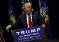 epa05247044 Businessman and US Republican presidential candidate Donald Trump reacts as he speaks at a campaign rally in Bethpage, on Long Island, New York, USA, 06 April 2016. Voters will go to the polls for the New York primary on 19 April.  EPA/PETER FOLEY