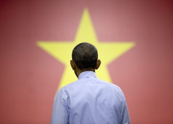 U.S. President Barack Obama turns to listen to a question from the audience as he speaks  to Vietnamese young people during the Young Southeast Asian Leaders Initiative (YSEALI) town hall at the at the GEM Center in Ho Chi Minh City, Vietnam, Wednesday, May 25, 2016. (AP Photo/Carolyn Kaster)