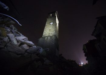 A night view of the church bell tower in the largely destroyed Lazio mountain village of Amatrice, Italy, one week after the devastating earthquake, 31 August 2016. Last Wednesday's 6.2 magnitude earthquake left a total of 292 dead. ANSA/MASSIMO PERCOSSI