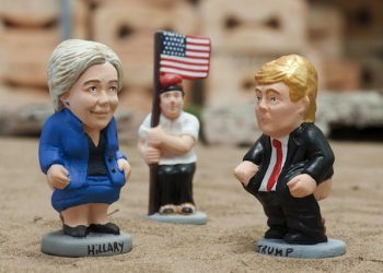epa05617665 Two traditional Christmas little sculptures called 'caganers' (lit. defecators) picturing US presidential candidates Hillary Clinton (L) and Donald Trump (R) were launched by the brand caganer.com in the town of Torroella de Montgri, Catalonia, northeastern Spain, 04 November 2016. The 'caganer' is a traditional figure in Catalonian nativity scenes.  EPA/ROBIN TOWNSEND