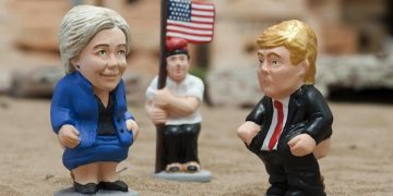 epa05617665 Two traditional Christmas little sculptures called 'caganers' (lit. defecators) picturing US presidential candidates Hillary Clinton (L) and Donald Trump (R) were launched by the brand caganer.com in the town of Torroella de Montgri, Catalonia, northeastern Spain, 04 November 2016. The 'caganer' is a traditional figure in Catalonian nativity scenes.  EPA/ROBIN TOWNSEND