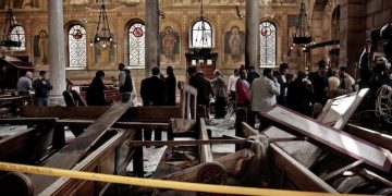 Security forces examine the scene inside the St. Mark Cathedral in central Cairo, following a bombing, Sunday, Dec. 11, 2016. The blast at Egypt's main Coptic Christian cathedral killed dozens of people and wounded many others on Sunday, according to Egyptian state television, making it one of the deadliest attacks carried out against the religious minority in recent memory. (ANSA/AP Photo/Nariman El-Mofty) [CopyrightNotice: Copyright 2016 The Associated Press. All rights reserved.]