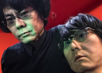 Robotics scientist Hiroshi Ishiguro (L) poses with 'Geminoid' a prototype of a Doppelganger-type android, modeled after himself, at the Museum of Contemporary Art of Rome, usually known as MACRO, Italy, 24 November 2016. "Geminoid" is the first android to be modeled after a real person, including subtle body movements and personality traits of the individual.
ANSA/MASSIMO PERCOSSI
