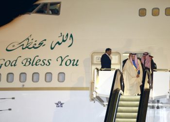 Saudi Arabia's King Salman step down the ramp upon his arrival at Haneda International Airport in Tokyo, Sunday, March 12, 2017. (AP Photo/Shizuo Kambayashi)