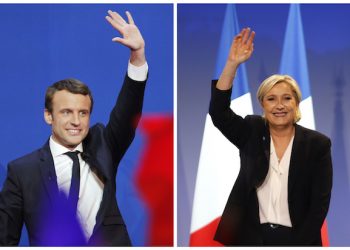 Far-right candidate for the presidential election Marine Le Pen waves at supporters after she delivers a speech during a meeting in Bordeaux, southwestern France, Sunday, April 2, 2017. Polls suggest that Le Pen and independent centrist Emmanuel Macron are the two top contenders in the election. The top two vote-getters on April 23 will compete in a presidential runoff on May 7. (AP Photo/Bob Edme)