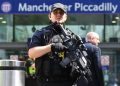 epa05983562 Armed police on patrol in central Manchester, Britain, 23 May 2017. According to a statement by the Greater Manchester Police, at least 22 people have been confirmed dead and around 59 others were injured, in an explosion at the Manchester Arena on the night of 22 May at the end of a concert by US singer Ariana Grande. Police believe that the explosion, which is being treated as a terrorist incident, was carried out by a single man using an improvised explosive device (IED), who was confirmed dead at the scene. British Prime Minister Theresa May in the meantime had condemned the incident as 'an appalling terrorist attack.'  EPA/ANDY RAIN