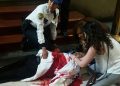 epa05967044 Two woman and a police officer try to help a priest that was stabbed during mass at the Catedral Metropolitana in Mexico City, Mexico, 15 May 2017. The priest is currently hostitalized in 'delicate but stable' condition, according to goverment and Ecclesiastical sources. Official sources stated that the Federal Police 'handed over to the Centra Investigation Agency a man of approximately 28 years of age, who allegedly stabbed the priest'. The alleged assailant 'called himself John Rock Schild' and is apparently a north american artist.  EPA/STR ATTENTION EDITORS: GRAPHIC CONTENT