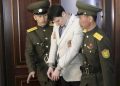 American student Otto Warmbier, center, is escorted at the Supreme Court in Pyongyang, North Korea, Wednesday, March 16, 2016. North Korea's highest court sentenced Warmbier, a 21-year-old University of Virginia undergraduate student, from Wyoming, Ohio, to 15 years in prison with hard labor on Wednesday for subversion. He allegedly attempted to steal a propaganda banner from a restricted area of his hotel at the request of an acquaintance who wanted to hang it in her church. (ANSA/AP Photo/Jon Chol Jin)