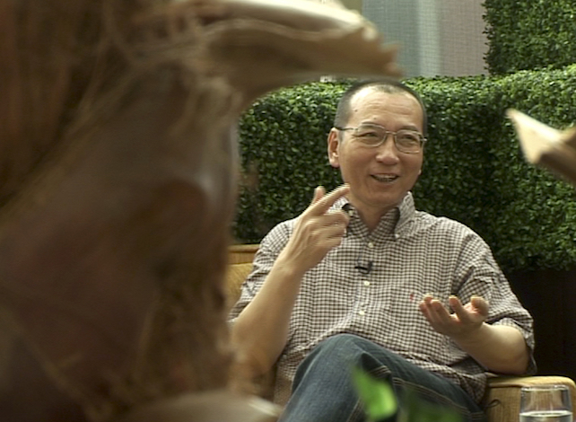 In this image taken from June 3, 2008,  video footage by AP Video, Liu Xiaobo speaks during an interview before his detention in Beijing, China. China's ailing Nobel Peace Prize laureate Liu Xiaobo's health is further deteriorating as abdominal fluid accumulates, said a friend on Thursday, July 6, 2017, and the Chinese hospital that is treating him, adding to concerns about the long-term prognosis of the country's best-known political prisoner.(AP Video via AP)