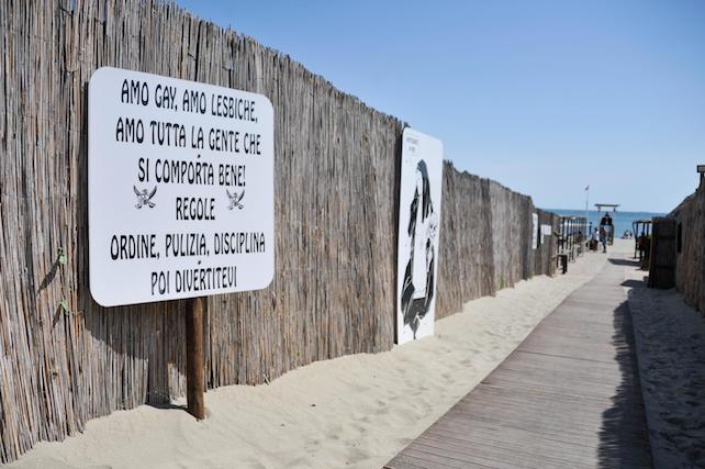 A sign reading ''I love gays, I love lesbians, I love all the people who behave well. Order, cleanliness, discipline and severity. Then enjoy yourself'' is seen at Punta Canna beach establishment in Chioggia, near Venice, northern Italy, 10 July 2017. Venice Prefect Carlo Boffi on Monday signed an order for the beach establishment to "immediately remove all references to Fascism on signs, posters and banners". The move comes after reports of images sympathetic to Fascism and Benito Mussolini at Chioggia's Punta Canna establishment caused a furore. ANSA/ ALESSANDRO SCARPA