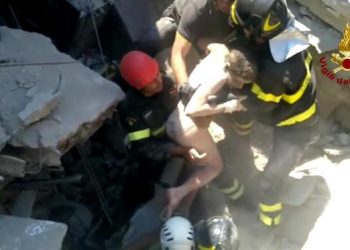 This grab provided by vigili del fuoco video shows eleven-year-old Ciro, saved by rescuers in the ruins of his house that collapsed at Casamicciola, Ischia, Italy, 22 August 2017. A 4.0 magnitude earthquake hit Ischia island on 21 August, killing two people and injuring 39. 
ANSA/VIGILI DEL FUOCO EDITORIAL USE ONLY