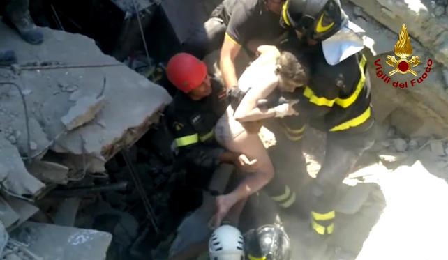 This grab provided by vigili del fuoco video shows eleven-year-old Ciro, saved by rescuers in the ruins of his house that collapsed at Casamicciola, Ischia, Italy, 22 August 2017. A 4.0 magnitude earthquake hit Ischia island on 21 August, killing two people and injuring 39.  ANSA/VIGILI DEL FUOCO EDITORIAL USE ONLY