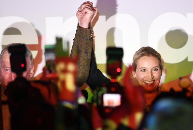 epa06224614 Co-top candidates for the general elections of the German right-wing populist party 'Alternative for Germany' (AfD), Alexander Gauland (L) and Alice Weidel (R) react to journalists and supporters at a night club where right-wing populist party AfD holds their election event in Berlin, Germany, 24 September 2017. According to federal election commissioner more than 61 million people were eligible to vote in the elections for a new federal parliament, the Bundestag, in Germany.  EPA/CHRISTIAN BRUNA