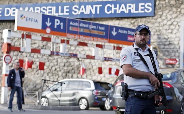 epa06238818 Police offciers guard at the train station of Saint Charles after a man armed with a knife had allegedly attacked passengers at the train station, in Marseille, France, 01 October 2017. According to media reports, at least two people were killed by a man with a knife at Gare de Marseille-Sain Charles.  EPA/Sebastien Nogier