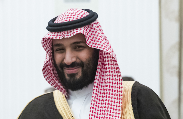 Russian President Vladimir Putin, left, shakes hands with Saudi Deputy Crown Prince and Defense Minister Mohammed bin Salman in Moscow's Kremlin, Russia, Tuesday, May 30, 2017. (AP Photo/Pavel Golovkin, pool)