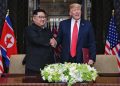 epa06801604 US President Donald J. Trump (R) and North Korean Chairmain Kim Jong-un (L) shake hands after signing a document during their historic DPRK-US summit, at the Capella Hotel on Sentosa Island, Singapore, 12 June 2018. The summit marks the first meeting between an incumbent US President and a North Korean leader.  EPA/KEVIN LIM / THE STRAITS TIMES /   EDITORIAL USE ONLY  EDITORIAL USE ONLY