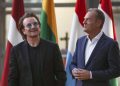 epa07083543 European Council President Donald Tusk (R) welcomes Bono (L), Irish band U2 singer and co-founder of the One campaign in Brussels, Belgium, 10 August 2018. Bono is in Brussels to discuss part of campaign of ONE, an international campaigning and advocacy organisation of more than nine million people taking action to end extreme poverty and preventable disease particularly in Africa.  EPA/OLIVIER HOSLET