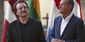 epa07083543 European Council President Donald Tusk (R) welcomes Bono (L), Irish band U2 singer and co-founder of the One campaign in Brussels, Belgium, 10 August 2018. Bono is in Brussels to discuss part of campaign of ONE, an international campaigning and advocacy organisation of more than nine million people taking action to end extreme poverty and preventable disease particularly in Africa.  EPA/OLIVIER HOSLET