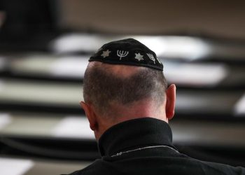 epa07153034 A participant wearing a kippa attends a commemoration ceremony in Paul's Church (Paulskirche) in Frankfurt am Main, Germany, 09 November 2018. The year 2018 marks the 80th anniversary of the Kristallnacht, also known as Night of Broken Glass, a pogrom against the Jewish community that took place on the night from the 09 to the 10 of November 1938. SA (Sturmabteilung) paramilitary forces attacked, ransacked and burnt Jewish-owned stores, buildings and synagogues throughout Germany.  EPA/ARMANDO BABANI