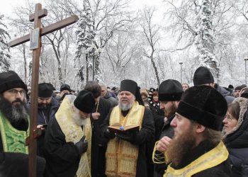 epa07242231 Ukrainian believers of the Ukrainian Orthodox Church of the Moscow Patriarchate pray in front of the parliament building in Kiev, Ukraine, 20 December 2018. Believers protest against changing of name their church. Ukrainian Parliament voted on 20 December the draft law according to which the Ukrainian Orthodox Church of the Moscow Patriarchate should change the name and indicate its affiliation with Russia. Bishop of the Ukrainian Orthodox Church of the Kyiv Patriarchate, Metropolitan of Pereiaslav and Bila Tserkva Epifaniy (Serhiy Dumenko) has been elected head of the local Orthodox Church in Ukraine at the unification council of the Ukrainian Orthodox churches on 15 December 2018. The Holy Synod announced its decision that the Ecumenical Patriarchate would proceed to grant autocephaly to the Church of Ukraine on 11 October 2018.  EPA/STEPAN FRANKO
