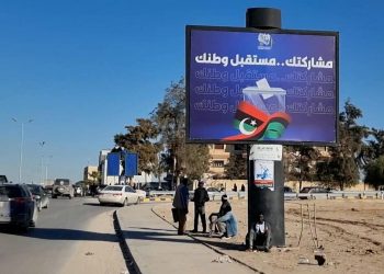 Un cartellone elettorale in Libia