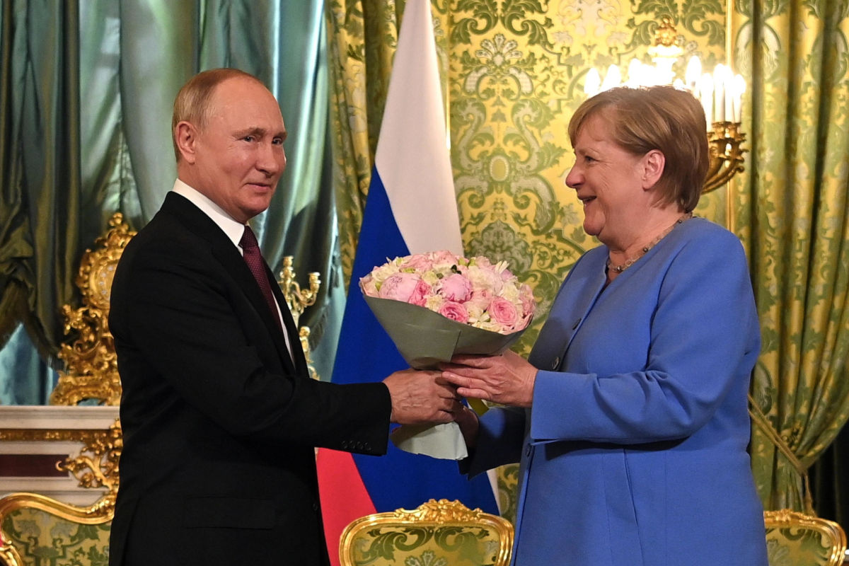 Vladimir Putin e Angela Merkel